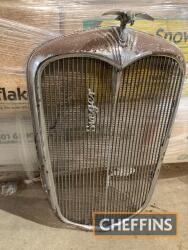 1030s Singer Bantam radiator cover, complete with mascot