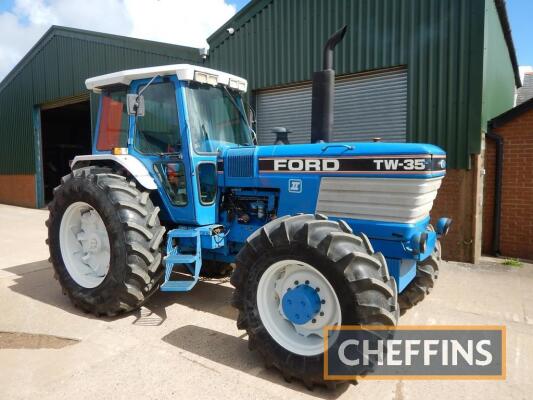 FORD TW-35 II 4wd diesel TRACTOR Fitted with Super Q cab, ZF front axle, linkage, PTO, drawbar, rear 222kg wheel weights and 12no. 45kg underslung leaf weights on 520/85R38 PAVT rear and 16.9R28 front wheels and tyres Reg. No. B529 MAO. Serial No. A914909