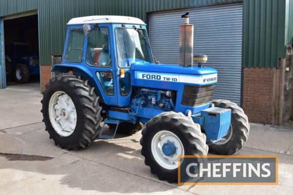 FORD TW-10 4wd diesel TRACTOR Fitted with Q cab, ZF front axle, turbo, dual power, linkage, drawbar and 12no. front weights on 460/85R38 PAVT rear, 14.9-24 front wheels and tryes Reg. No. ADV 729X . Serial No A911591