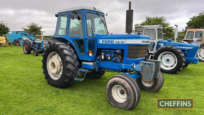 FORD TW-10 2wd diesel TRACTOR Fitted with Q cab, linkage, drawbar and 222kg wheel weights on 20.8R38 PAVT rear and 9.00-16 front wheels and tyres Reg. No. PVL 928V Serial No. A907844  Hours: 8,322