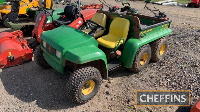 John Deere 6x4 Gator tipping back