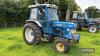 1987 FORD 7610 SII. 2wd TRACTOR Fitted with cab and PUH on 460/85R34 rear and 295/80-15.3 front wheels and tyres Reg. No. E718 RKP  Hours 6913.Serial No. B26438 FDR: 01/08/1987