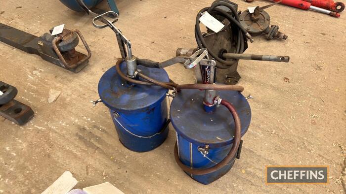 Free-standing grease pump, together with another