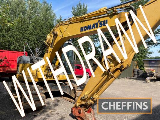 WITHDRAWN 2007 KOMATSU PC138US 360° metal tracked EXCAVATOR Track pads imaged are not included with the sale of this lot Serial No. 6821 Hours: 5,088