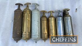 Selection of brass and chrome vintage fire extinguishers