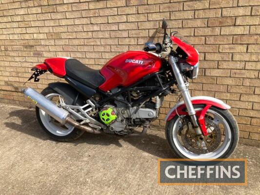 2000 900cc Ducati Monster 900ie MOTORCYCLE Reg. No. N/A Frame No. TBA Engine No. TBA Finished in red and white with white wheels the fuel injected Monster is fitted with Arrow silencers and an aftermarket clutch cover, consigned from Denmark and showing 3