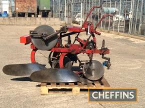 International B12 match plough, complete with Ransomes discs and skimmers, sliding cross-shaft, moving depth wheel, weights and spare points, and original International discs, skimmers and disc shanks, 2no. spare plough legs, International Ace points and 