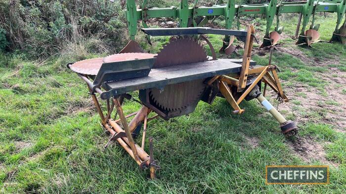 McConnell mounted PTO-driven saw bench with two spare blades