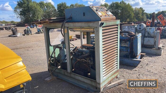 Generator 3 Phase fitted with 3cyl. Ford diesel engine in cabinet with control panel Hours: approx 449