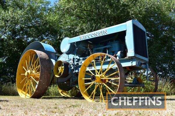 WISCONSIN Model E 4cylinder petrol TRACTOR Serial No. 2458 A very rare machine and one of just three known survivors from a production run of only 500-600 tractors. The Wisconsin Model E was developed by two partners, Earl McFarlane and John Westmont, who