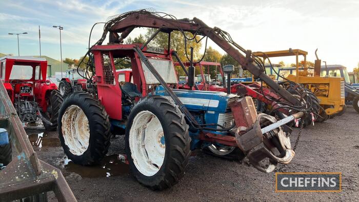 1975 COUNTY 654 4cylinder diesel TRACTOR Reg. No. HTH 483N Serial No. 948889 Fitted with a hydraulic timber grab and crane, mounted rear winch and single assistor ram