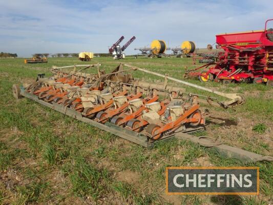 Stanhay 12-row mounted sugar beet drill, fitted with bout markers and on single axle flatbed transport trailer