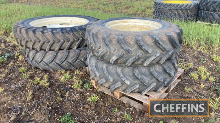 4no. pr. Michelin Agribib 380/90R46 rear and pr. Maximo 380/85R30 front wheels and tyres with New Holland centres