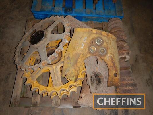 Caterpillar D4 sprockets, together with bottom rollers and tinwork