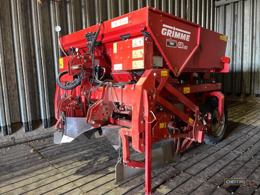 Grimme GB215 2 row mounted belt planter, front soil plough, steel openers with stainless wear strip, soil retention panels, stainless moulding hood, steering rear wheels and tipping hopper. Chafer AS120 liquid fertiliser applicator included. Serial No 204