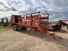 Larrington trailed tandem axle straw layer, hydraulic drop down sides, conveyor web feed to chopper rotors. Twin axle 12.5-20 wheels and tyres. Poly roll carriers and rear guide fingers. In cab control box. Serial No 492RL98, Year 1998. Location Chatteris - 2