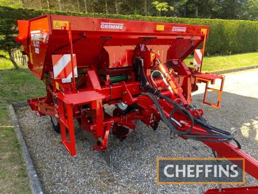 Grimme GL42T trailed belt planter, hydraulic levelling of planter units, self-centre steering, hydraulic agitation for belts, hydraulic tipping hopper, drawbar steering c/w centering, oversize wheels. Year 2010. Location Banff, Aberdeenshire.