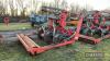 2016 Mastek Slurry Mate 5 leg Cultivator c/w slurry injectors, front spring loaded discs, hydraulic autoreset subsoiler tines and hydraulic adjustable rear flat press roller. Hydraulic slurry macerator distribution head and pipe guide bracket. Ser. No. - 9