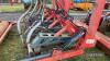 2017 Mastek Slurry Mate 5 leg Cultivator c/w slurry injectors, front spring loaded discs, hydraulic autoreset subsoiler tines and hydraulic adjustable rear flat press roller. Hydraulic slurry macerator distribution head and pipe guide bracket. Ser. No. - 8