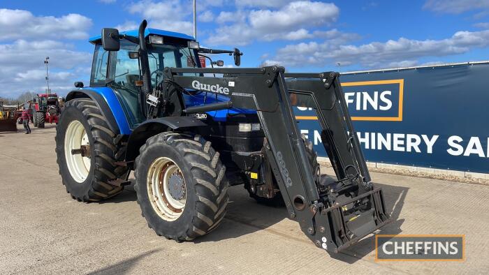 New Holland TM165 Tractor c/w Quicke 990 loader, 40kph, air con, cab suspension Reg. No. EZ02 KMZ