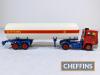 6no. model kit-built articulated tanker trucks and lorries including ERF Texaco and McVitie's, Scammell etc. Believed to be ASAM models. Some damage to paintwork and detail parts such as wing mirrors etc. c. 1:48 scale - 10