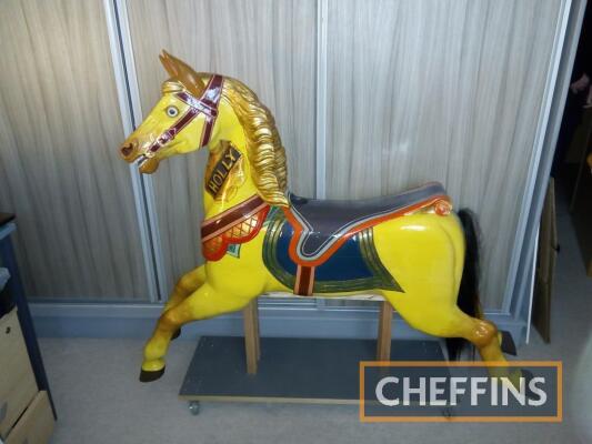 Full size carved wooden fairground galloper horse with glass eyes, measuring 43x53ins, not including stand