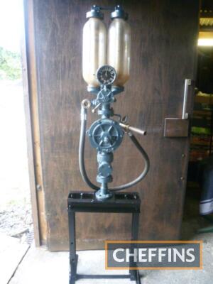 Hammond No.4 wall mounted pre-war petrol pump. Twin visible gallon glasses, original Hammond nozzle. This pump has been mounted on a display stand but could be wall mounted. Reported to have been part of a private collection, stored inside for some 20+ ye