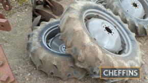 Pair 11x28 tractor wheels with Firestone tyres. From the estate of Mike Childerley