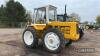 1975 MUIR HILL 121 6cylinder diesel 4wd TRACTOR Serial No. 121/20895 The vendor states this tractor has been subject to a bare metal respray and is running and driving well in all gears. Copy of build sheet with Cheffins office