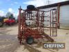 Kverneland TE63 mounted hydraulic folding springtine cultivator, 6m fitted with 4 rows tines, levelling board and rear crumbler Serial. No. 403 - 4