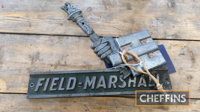 Field Marshall metal badge together with International Harvester badge