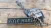 Field Marshall metal badge together with International Harvester badge