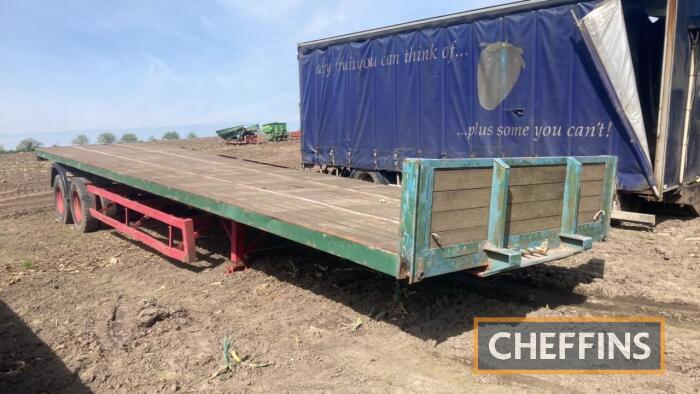 Tandem axle flat bed trailer (no dolly)