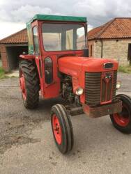 1962 MASSEY FERGUSON 65 diesel TRACTOR Reg. No. 870 BWE Serial No. SNDY544115 This tractor is stated to be in very good mechanical condition and has been used for seasonal hedge cutting most of its life. It was fitted with a mid-mounted hedge cutter that 