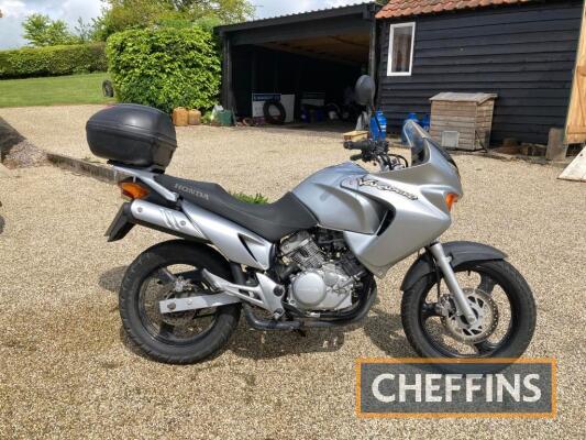 2003 125cc Honda Varadero MOTORCYCLE Reg. No. AU03 YHH Frame No. VTMJC32A03E100082 Engine No. JC29 Showing just 4,687 miles at the time of cataloguing, the well regarded V twin has been used primarily as a holiday home runaround. The sea air has taken a t