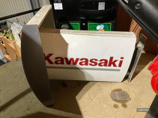 Kawasaki, a double sided wall mounting illuminating sign designed for forecourt fitting c/w bracket shroud 35x23ins