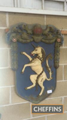 Shield crest depicting a unicorn with chains, approx.41x30ins