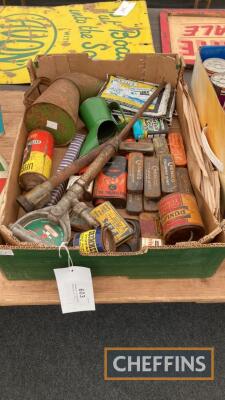 Selection of assorted motoring oil tins