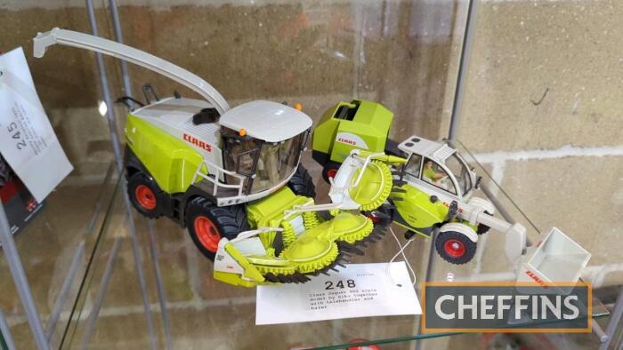 Claas Jaguar 960 scale model by Siku together with telehandler and baler