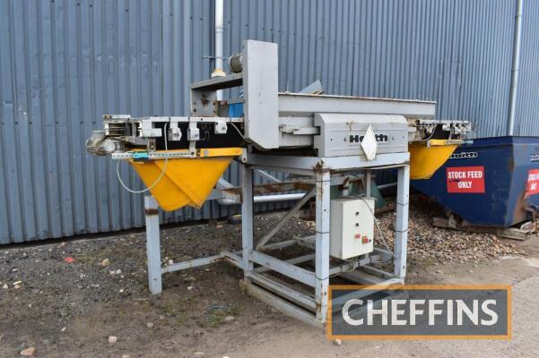 2014 Haith box filler with feed elevator and Herbert hopper fill ends. Serial No. 21425-001 A load out charge of £65 applies to this lot. Please contact the auctioneers should you require further information