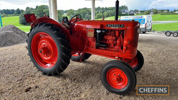 1957 NUFFIELD UNIVERSAL DM4 4cylinder diesel TRACTOR Reg. No. UWB 52 Serial No. DE3907 Fitted with safety frame. An older restoration with new tyres fitted. A photo album of the restoration is available