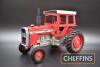 Ertl 1:16 scale Massey Ferguson 1105 with all weather cab and red rims, boxed, c1973-75 - 2