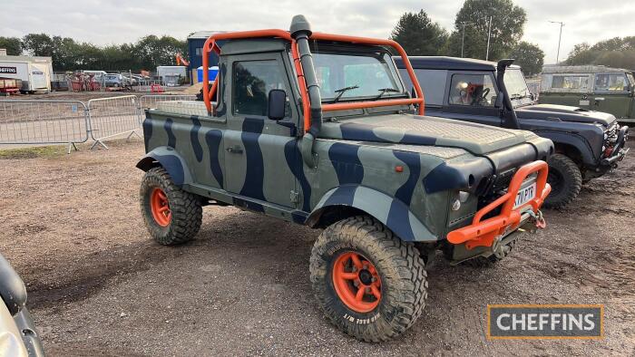 1992 LAND ROVER Defender 90 3950cc petrol 4X4 Reg. No. K711 PTR Chassis No. SALLHAMM3KA629032 MOT: expired Fitted with a petrol V8 engine and automatic gearbox. This 'comp safari' Land Rover presents in camouflage with orange wheels and matching colou