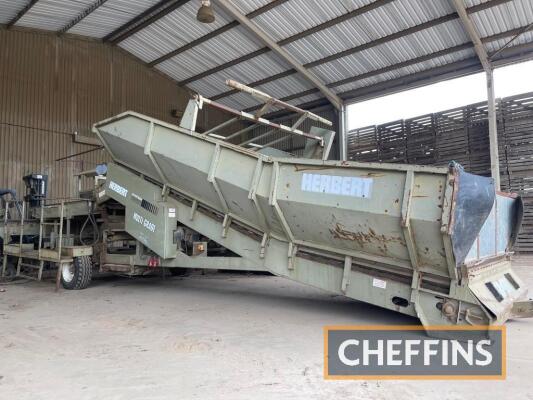 Herbert 1800 Multi Grade Mobile Grader c/w intake hopper, 6 rows of adjustable coils, soil conveyor underneath, 4 person inspection area with crop turnover roller and waste conveyor, 3 phase electrics, spare roller. 6ft wide. Ser. No. 1908911