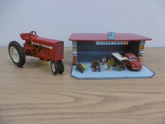 Wooden garage model with steam engine, extras and large tractor