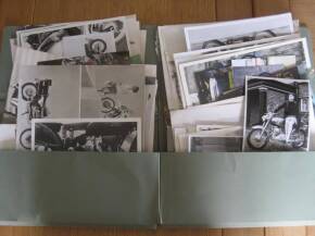 Two folders of motorcycle photos by many hands with much annotation, covers all types of machines from all era's and and includes studio images, a large qty