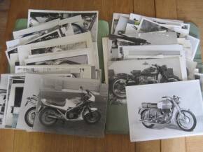 Two folders of motorcycle photos by many hands with much annotation, covers all types of machines from all era's and and includes studio images, a large qty