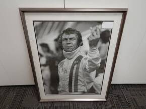 Steve McQueen, a framed and glazed image of the famous 'victory' salute