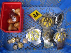 Box of AA badges and wooden gear knobs, including MG
