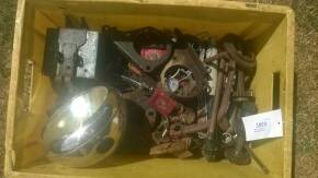 Box of British motorcycle parts